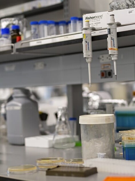 Laboratory bench with scientific instruments organized by calibration category