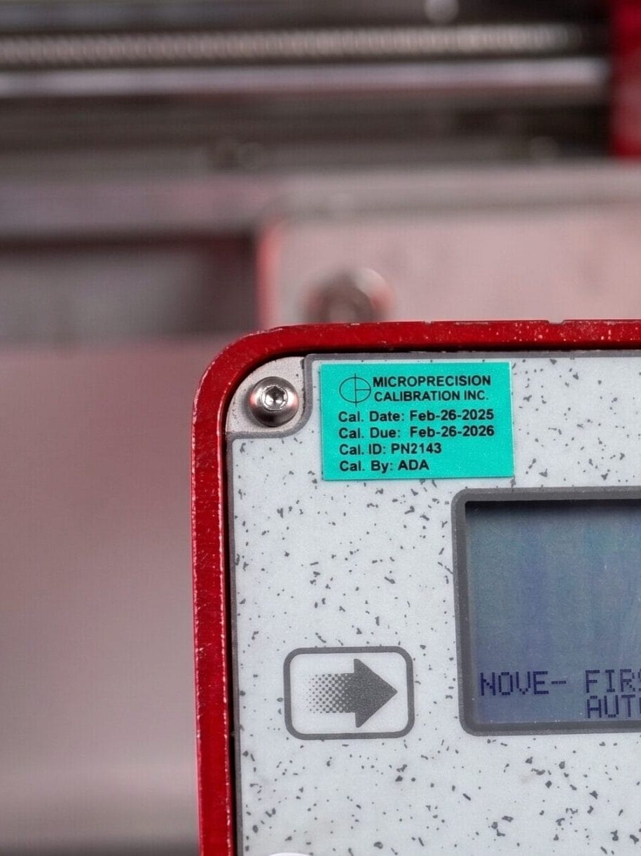 Micro Precision Cal Sticker on an Equipment