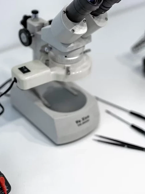 Calibration technician performing a standard calibration service on precision lab instruments
